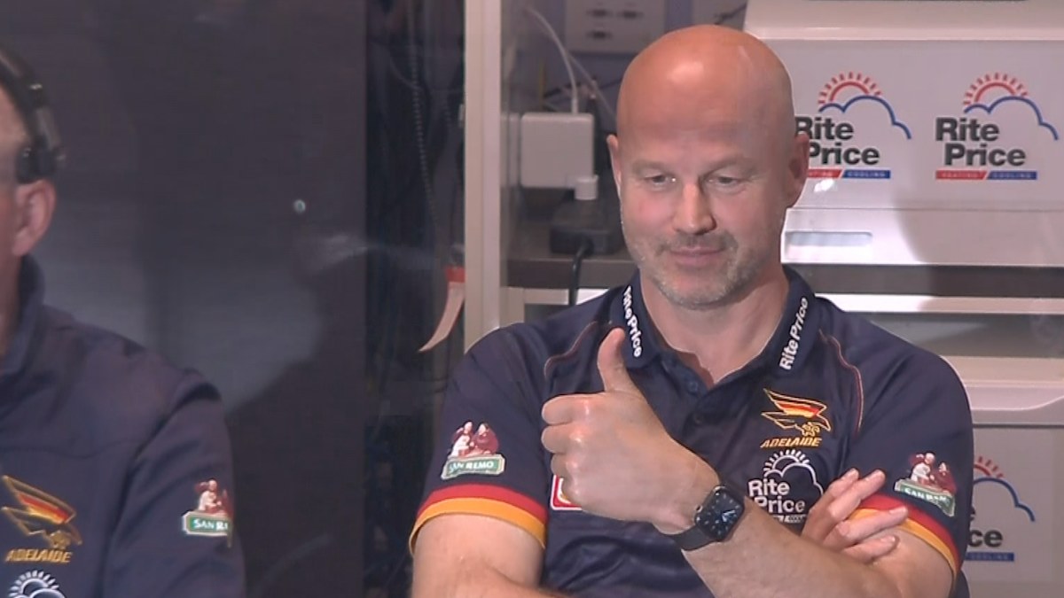 Crows coach’s simple message to fans as finals win likely saves his job