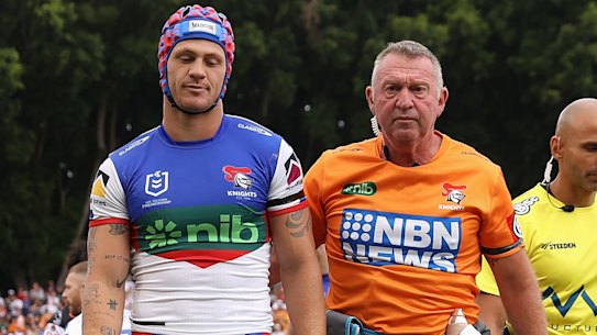 Kalyn Ponga leaves the field after an early injury at Leichhardt Oval on Sunday.