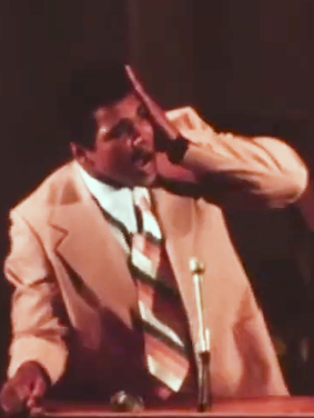 Muhammad Ali delivers a speech at Harvard in 1975.