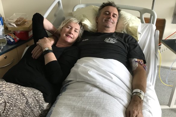 Geoff Martin, 58, with his wife Therese Martin. He went to hospital three times before he was diagnosed with encephalitis.