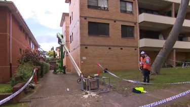 A man was rushed to hospital after the cherry picker he was in collapsed. 