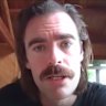 Perth conspiracy theory and occult podcaster Tobias Nuttall has been charged with murder.