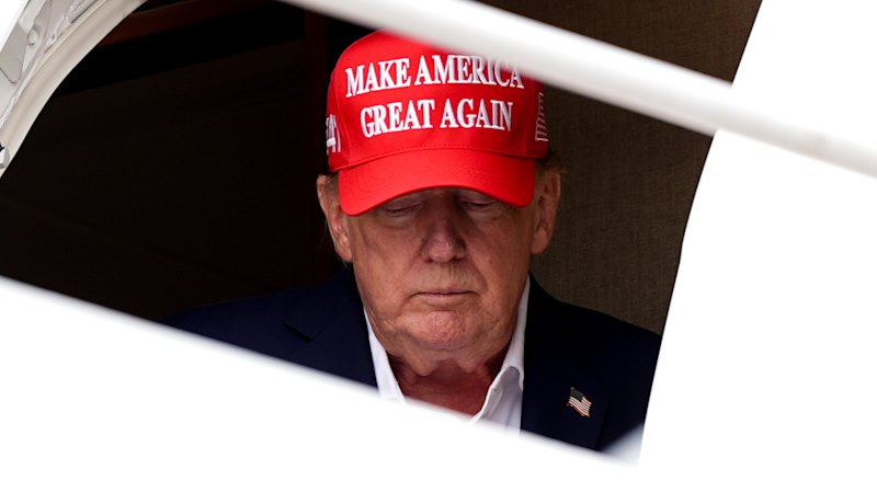 Trump changes planes after threats, with staff and media left unaware