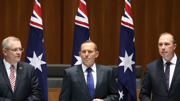Joke under fire: Peter Dutton, right, with Tony Abbott and Scott Morrison in 2015.