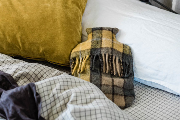 Made in Victoria, this hot-water-bottle cover is crafted from recycled wool tartan blankets.