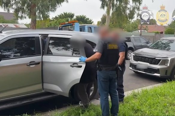 Police arrest one of the nine men alleged to have conspired in the drug trafficking plot.