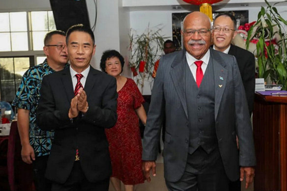 Zhao Fugang (left) with Fijian Prime Minister Sitiveni Rabuka at a festival in 2023.