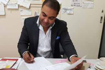 Former PSP Property Group agent Randeep Dhaliwal in the office of the then president of the Melbourne Linh Son Buddhist Society.