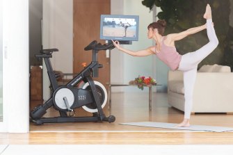 The NordicTrack S22i offers a library of cycle, HIIT, yoga and cross-training workouts.