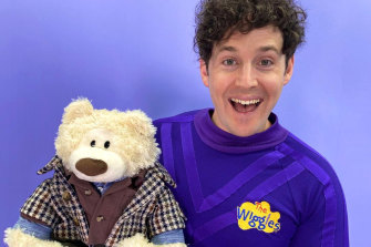 Purple Wiggle Lachlan Gillespie poses with the million dollar teddy bear.