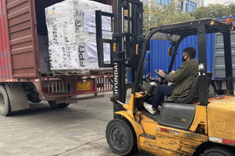 Pictures from the WeChat account of Chinese state-owned property developer Poly Australia, which sent medical supplies to China in January and February this year. 