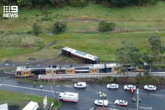 Transport for NSW said the train had hit an unattended car. 