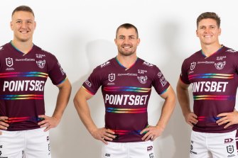 Sean Keppie, Kieran Foran and Reuben Garrick model the rainbow jersey.