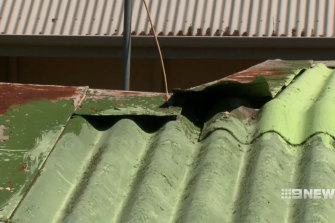 A group of conmen who posed as tradies were arrested over a roofing scam as they tried to flee the country. 