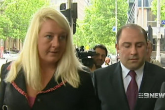 Nicola Gobbo with Tony Mokbel outside a court in 2004.