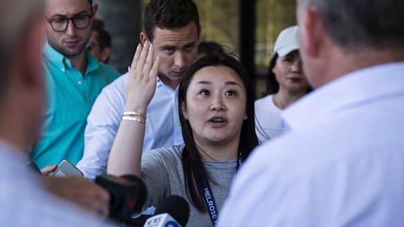 Residents of Opal Tower vent their frustration on Thursday.