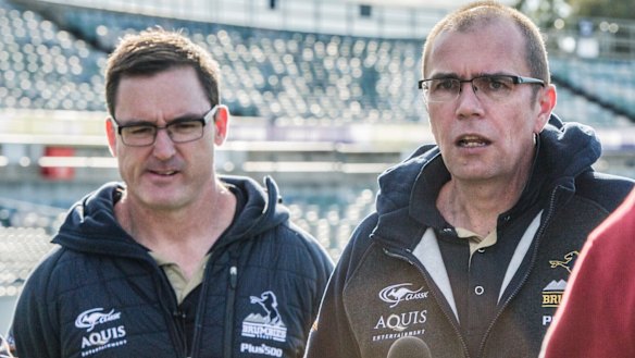 Brumbies boss Michael Thomson, right, is stepping down early.