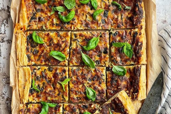 “Thin zucchini tart with basil and mint from @helen_goh_bakes Good Weekend Magazine. Easy and extremely delicious! I loved this tart, it was delicious eaten either warm or room temperature.”