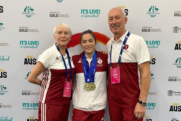Olga Belooussov, Georgia Godwin and Sasha Belooussov at the Australian Gymnastics Championships in 2021. Godwin is not involved in the allegations and is not the complainant.