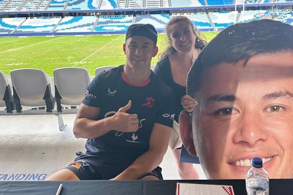 Roosters fan Josie Bolel with former player Joey Manu.