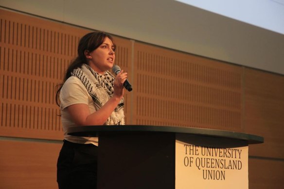 Ella Gutteridge speaks at the student general meeting, the largest in decades.