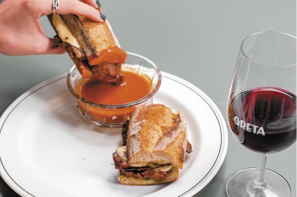 Beef cheek, mozzarella, pesto and napoli dip sandwich.