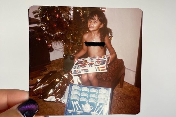 Sara Oscar “redacted my own nipples” on her childhood Christmas photo after Instagram took it down for failing to meet community standards.