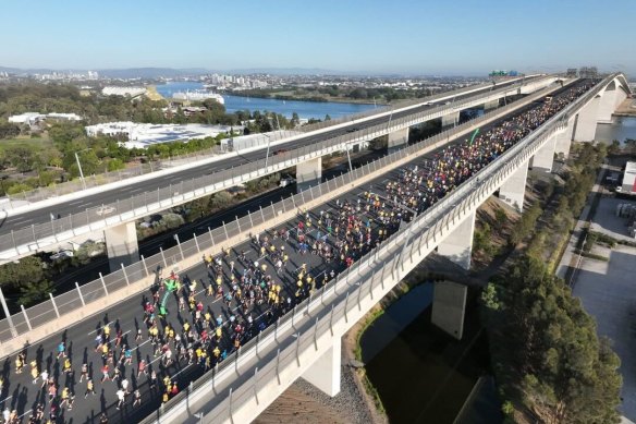Some of this year’s 30,000 participants cross the Gateway Bridge on their way to the RNA Showgrounds.  