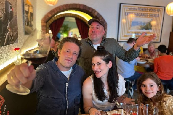 Jamie Oliver with chef Joey Kellock and Georgia and Birdie Puttock at 1800 Lasagne in Melbourne.