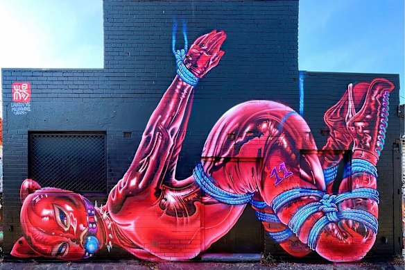 The mural before it was tagged over.