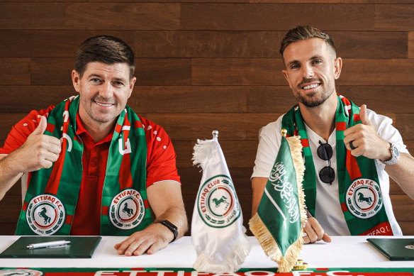 Jordan Henderson (right) with coach Steven Gerrard, signs on for Al-Ettifaq.
