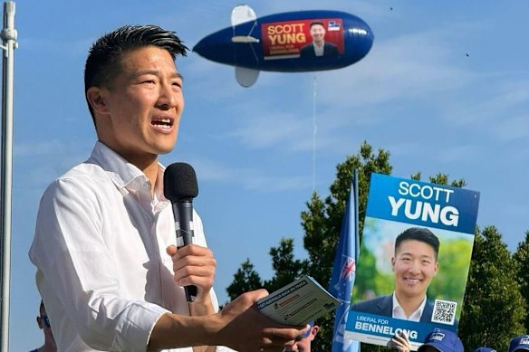 Scott Yung speaking during the federal election campaign, with an advertising blimp hovering overhead.