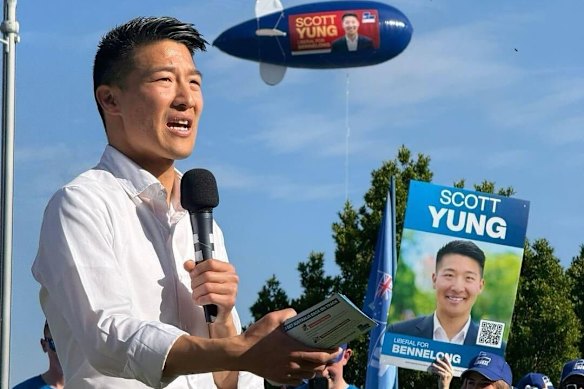 Scott Yung speaking during the federal election campaign, with an advertising blimp hovering overhead.