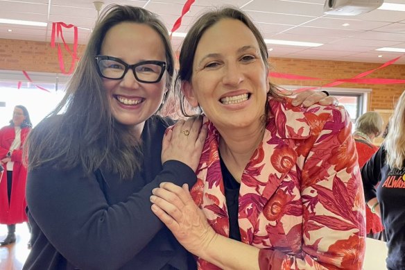 Labor’s Jordan Crugnale (right) and ALP MP Harriet Shing pose together in an image posted to social media by Shing after Crugnale claimed victory in the seat of Bass.