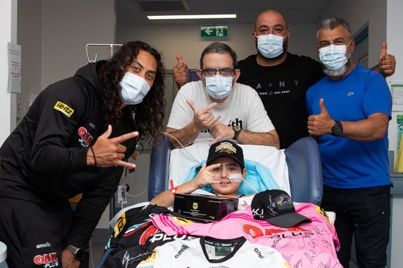 Jarome Luai with Nicholas Tadros and his family in February.