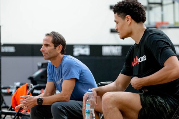 Australian NBA Draft hopeful Josh Green (right) speaks with trainer Joe Abunassar at IMPACT Basketball in Las Vegas.
