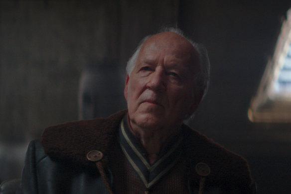 Acclaimed German filmmaker Werner Herzog as “the client” in a scene from The Mandalorian.