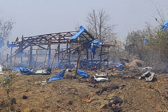 This photo provided by the Kyunhla Activists Group shows aftermath of an airstrike in Pazigyi village in Sagaing Region’s Kanbalu Township on Tuesday.