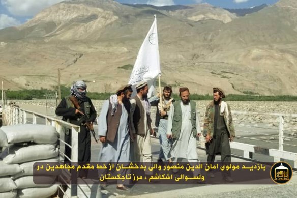 Footage from the Taliban’s propaganda arm, al-Emara, shows insurgents carrying the group’s flag at a bridge in Ishkashim between Afghanistan and Tajikistan. 