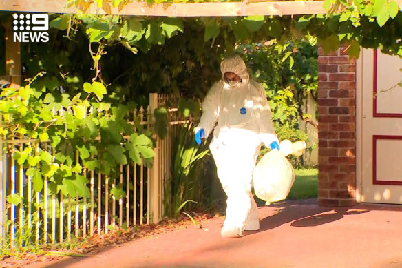 A crime scene has been established and forensic specialists are examining the home in Croydon.