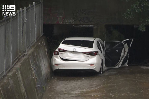 A Mazda 3 was found in the canal where two bodies were found by police divers. 