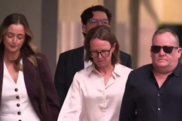 WA Police deputy commissioner Gailene Hamilton (centre, in white shirt) arrives at Perth Magistrates' Court on Monday.