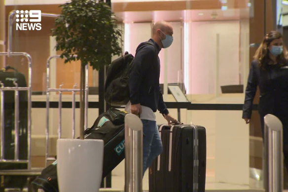 Australian cricketers leaving quarantine. 