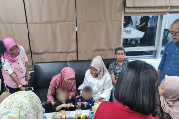 Siti Mauliah (in white) and Dian Hartono and their sons at a bonding session earlier this month.