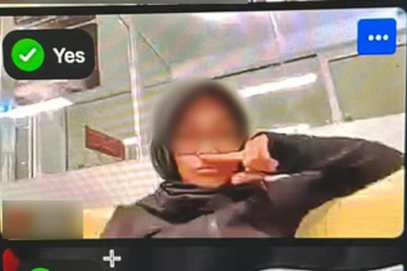 A screenshot of an ANU student allegedly performing a gesture impersonating Hitler on a Zoom call in 2024.