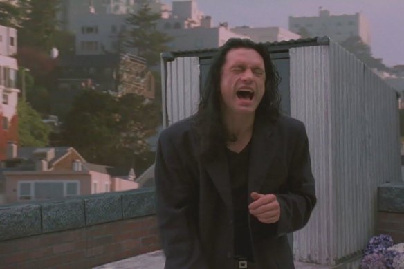 Not much is known about Tommy Wiseau, not even by co-star and friend Greg Sestero. Wiseau, pictured above in The Room, self-funded the production, which was a passion project and a box-office flop.