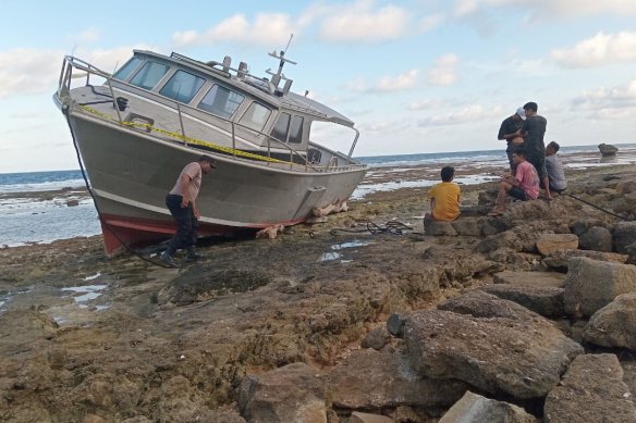 Border Force put the men on two boats and turned them back to Indonesia without maps or GPS. This one ran aground on rocks on Rote Island.