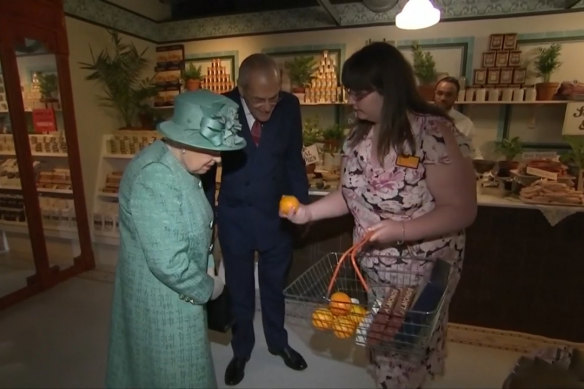 The Queen inspects groceries at a replica of the first-ever Sainsbury’s store, in London’s Covent Garden in 2019.
