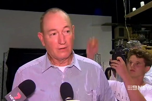 Then senator Fraser Anning, moments before he was egged by a teenager. 