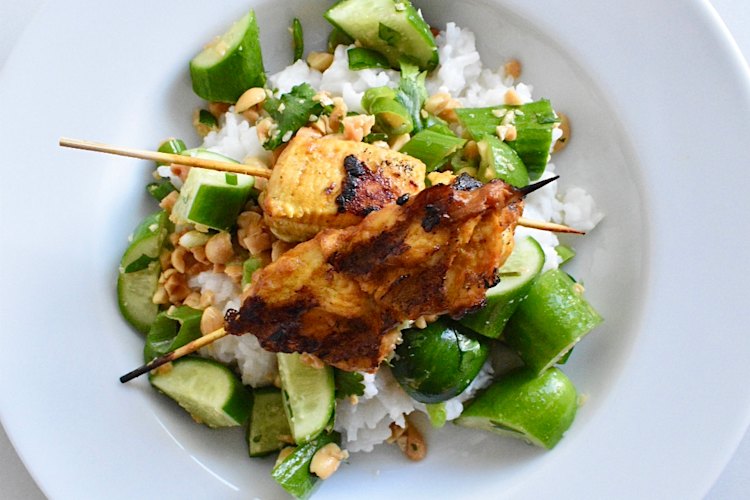 Satay chicken with cucumber salad and coconut rice is easy yet impressive.